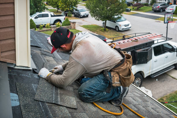 Professional Roofing technician working in Benton, IL